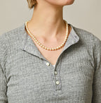 Top Totan Tereko Henley Detail