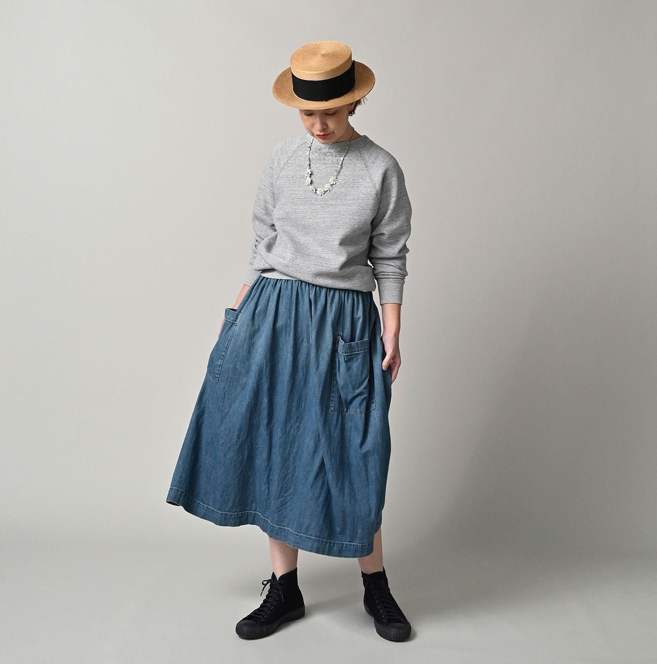 45 Petit Denim Apron Skirt Distressed Female Model