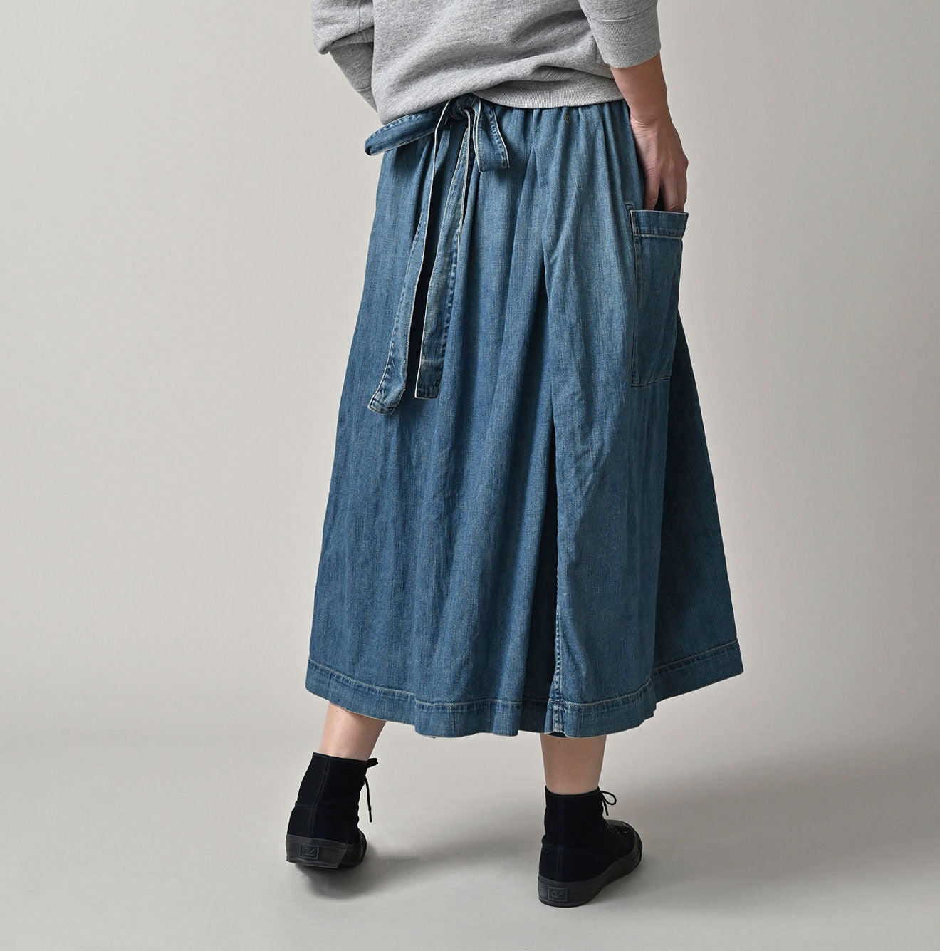 45 Petit Denim Apron Skirt Distressed Female Model